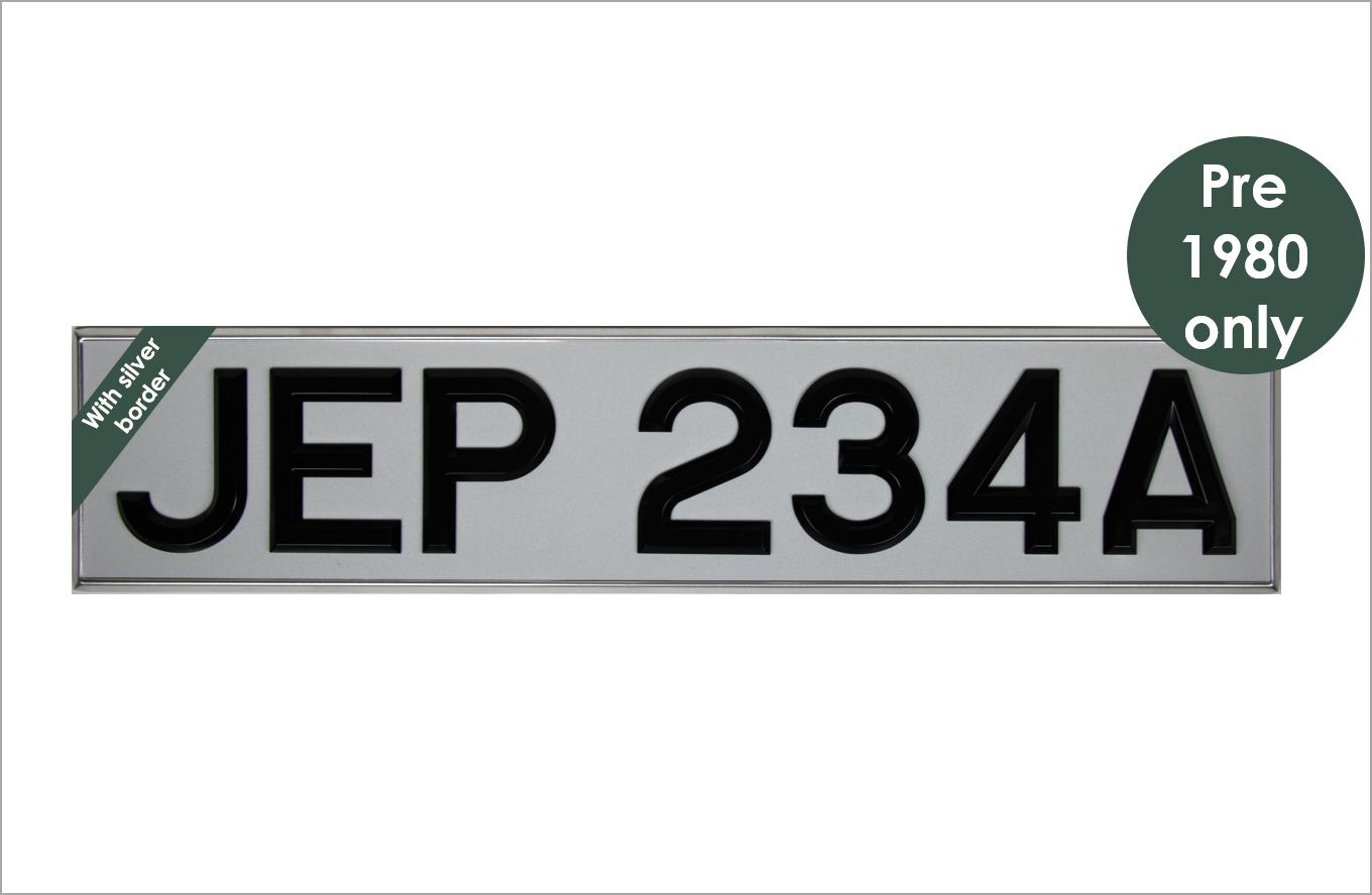 White oblong 20 1/2 x 4 1/2" with 3 1/8" black peak digits and silver bevel